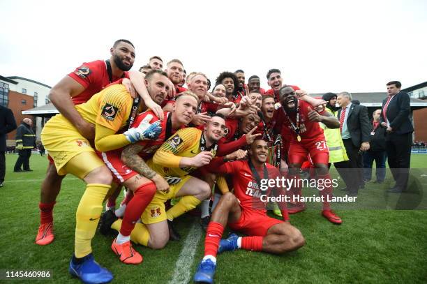 Leyton Orient players celebrate as they win the title after the Vanarama National League match between Leyton Orient and Braintree Town at Brisbane...