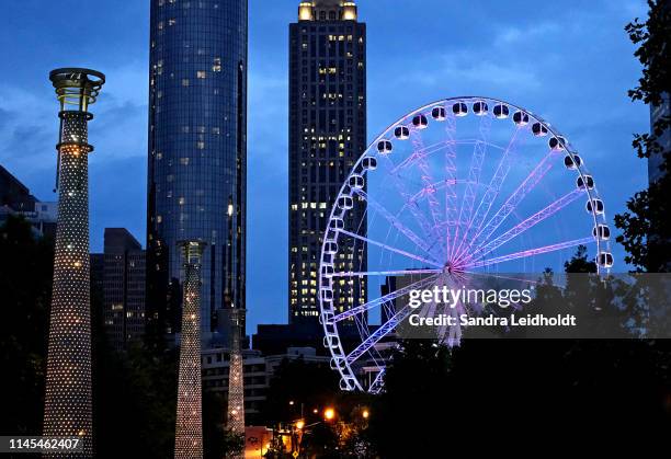 centennial park in atlanta, georgia - atlanta night life stock pictures, royalty-free photos & images