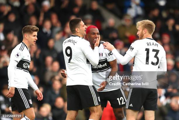 Ryan Babel of Fulham celebrates after scoring his team's first goal with team mates during the Premier League match between Fulham FC and Cardiff...