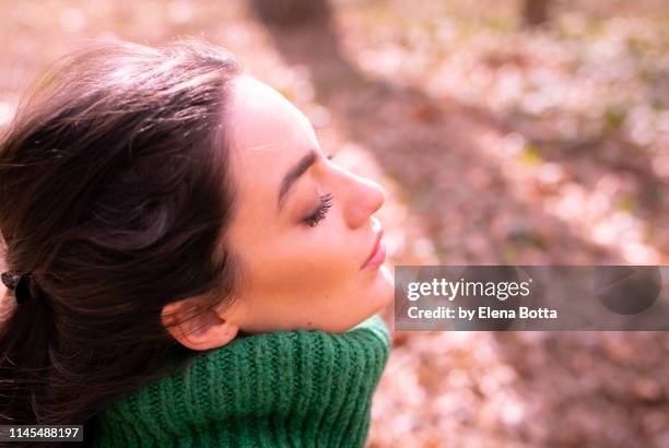 young girl at sunbath - hair parting stock pictures, royalty-free photos & images