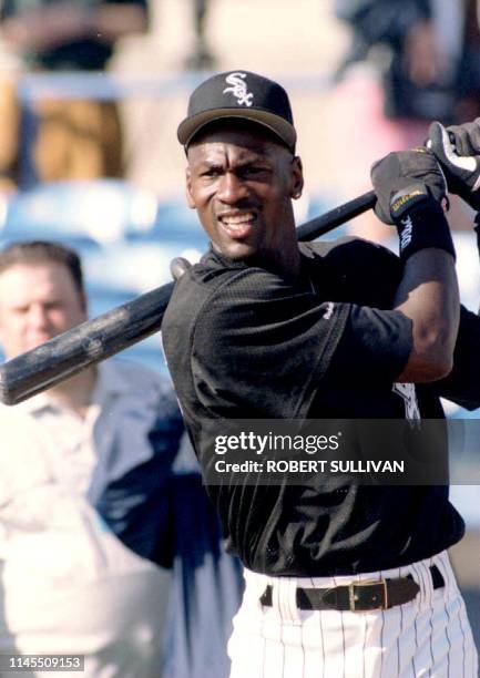 Ex-Chicago Bulls standout Michael Jordan warms up 15 February 1994 in Saratosa, FL, before his first spring training workout with the Chicago White...