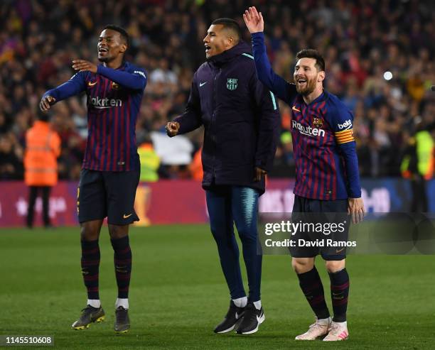 Nelson Semedo, Jason Murillo and Lionel Messi of FC Barcelona celebrate as they win the La Liga following their victory in the La Liga match between...