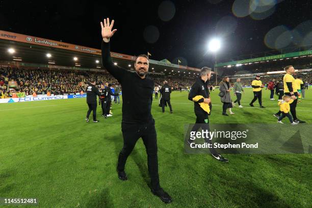 Daniel Farke, Manager of Norwich City shows appreciation to the fans as his team secure promotion to the Premier League following their victory in...