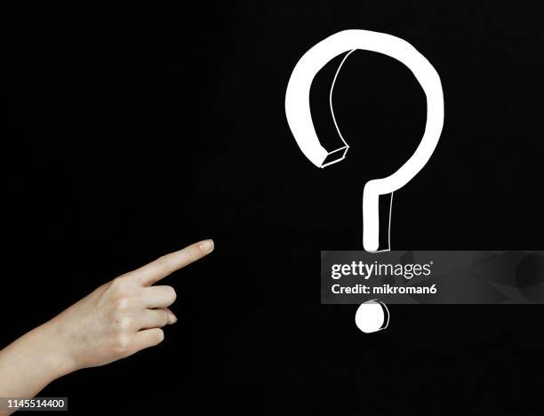 Point Left Question Mark Exclamation Point Question Mark Photos and Premium High Res Pictures ...