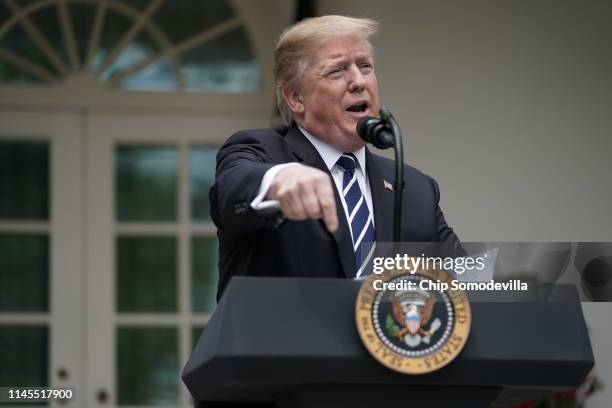 President Donald Trump speaks about Robert Mueller's investigation into Russian interference in the 2016 presidential election in the Rose Garden at...