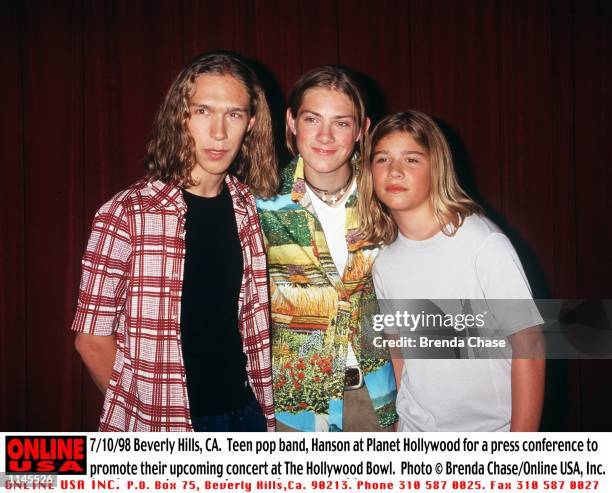 Beverly Hills, CA. Teen pop band, Hanson at Planet Hollywood for a press conference to promote their upcoming concert at The Hollywood Bowl.