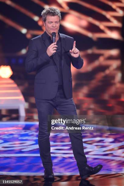 Host Oliver Geissen gestures during the season 16 finals of the tv competition show "Deutschland sucht den Superstar" at Coloneum on April 27, 2019...