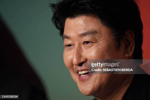 South Korean actor Kang-ho Song attends a press conference for the film "Parasite " at the 72nd edition of the Cannes Film Festival in Cannes,...