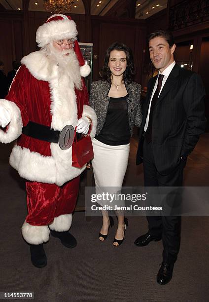 The Cartier Santa, Rachel Weisz and Frederic De Narp, President and CEO of Cartier