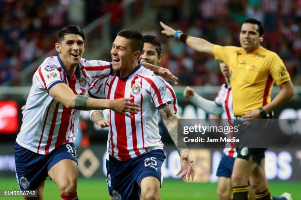 Alan Pulido of Chivas and Michael Perez of Chivas celebrate after scoring the second goal of his team during the 16th round match between Chivas and...