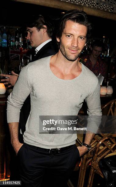 Model Louis Dowler attends the No Tell Motel Southern Comfort Room launch at Mahiki London on May 23, 2011 in London, England.