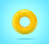 Yellow swimming ring on blue background