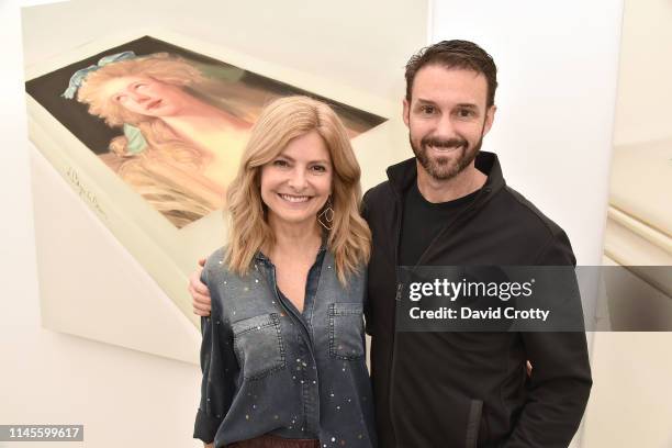 Lisa Bloom and Braden Pollock attend the opening of Robert Russell's "Book Paintings" exhibition at Anat Ebgi Gallery on April 27, 2019 in Los...