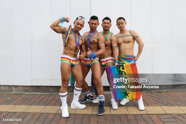 Participants pose for a photograph during the Tokyo Rainbow Pride Parade on April 28, 2019 in Tokyo, Japan. Thousands from the Japanese LGBT...