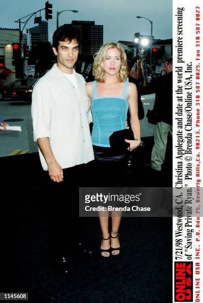 Westwood, CA. Christina Applegate and date at the world premiere screening of "Saving Private Ryan."