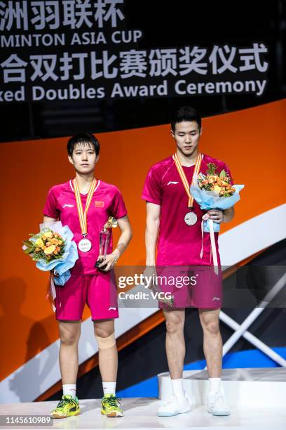 He Jiting and Du Yue of China celebrate after the Mixed Doubles final match against Huang Dongping and Wang Yilyu of China on day six of the Asian...