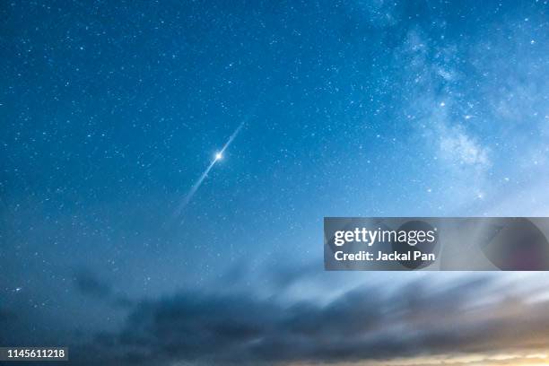 starry sky with clouds - nebula stock pictures, royalty-free photos & images