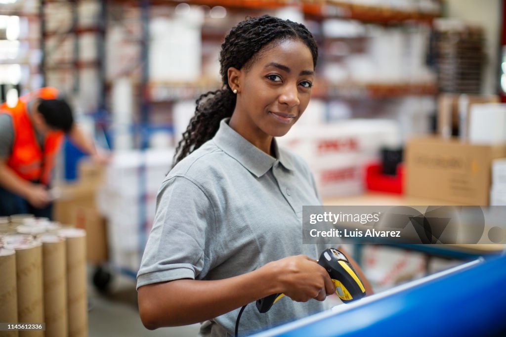 Woman working at distribution warehouse