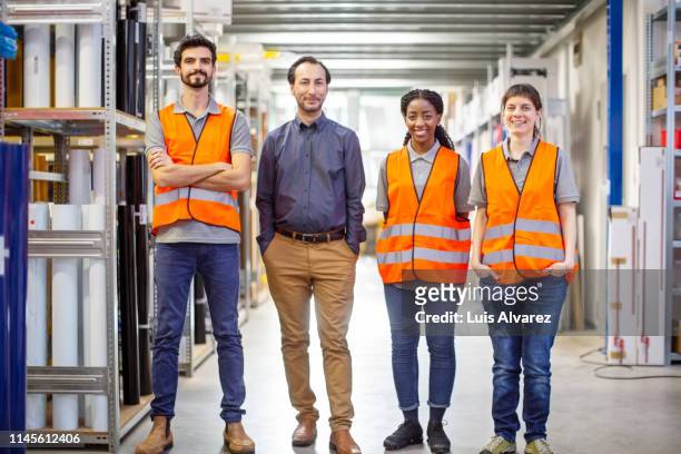 successful warehouse staff - employee safety stock pictures, royalty-free photos & images