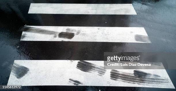 tire tracks in dangerous zebra crossing - skid marks accident stock pictures, royalty-free photos & images