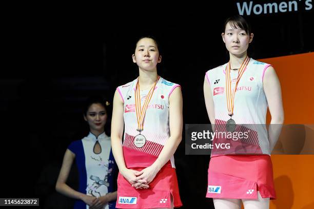 Mayu Matsumoto and Wakana Nagahara of Japan react after the Women's Doubles final match against Jia Yifan and Chen Qingchen of China on day six of...