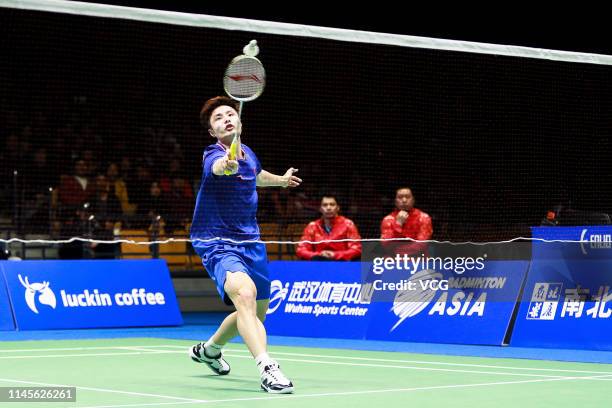 Shi Yuqi of China competes in the Men's Singles final match against Kento Momota of Japan on day six of the Asian Badminton Championship 2019 at...