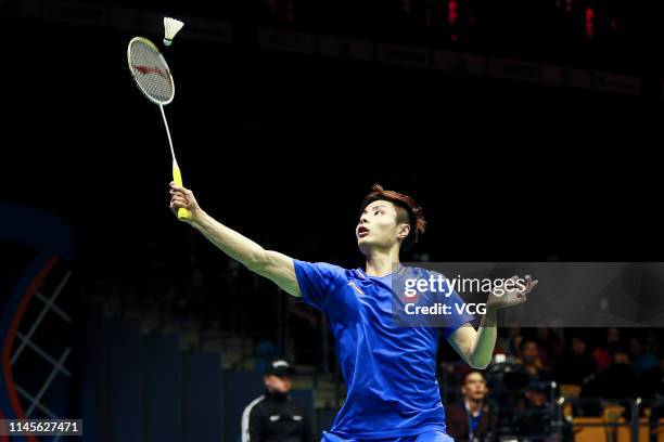 Shi Yuqi of China competes in the Men's Singles final match against Kento Momota of Japan on day six of the Asian Badminton Championship 2019 at...