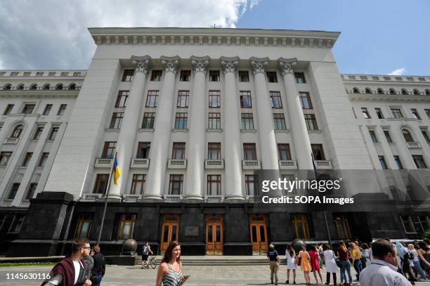 People are walking near the Presidential office building in downtown, Kiev. Ukrainian president Volodymyr Zelensky signed a decree about dissolving...