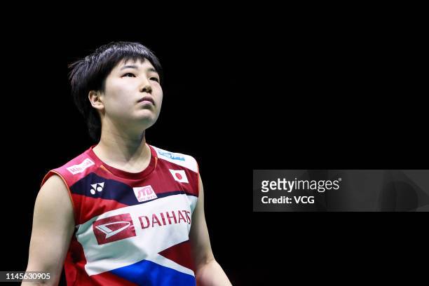 Akane Yamaguchi of Japan reacts in the Women's Singles final match against He Bingjiao of China on day six of the Asian Badminton Championship 2019...