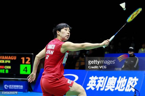 Akane Yamaguchi of Japan competes in the Women's Singles final match against He Bingjiao of China on day six of the Asian Badminton Championship 2019...