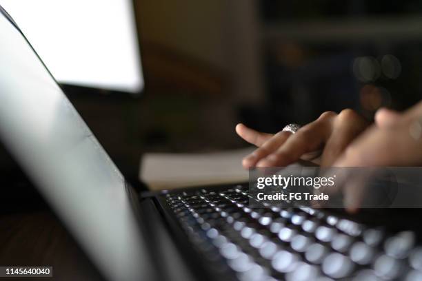 close-up of woman's hand using laptop - dedication background stock pictures, royalty-free photos & images