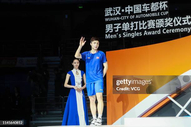 Shi Yuqi of China reacts after the Men's Singles final match against Kento Momota of Japan on day six of the Asian Badminton Championship 2019 at...