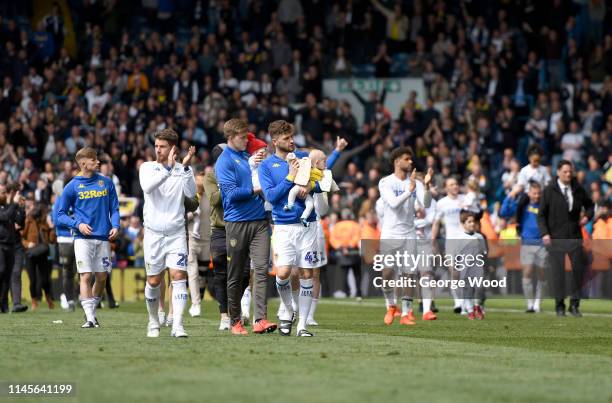 Leeds United players acknowledge the fans following the Sky Bet Championship match between Leeds United and Aston Villa at Elland Road on April 28,...