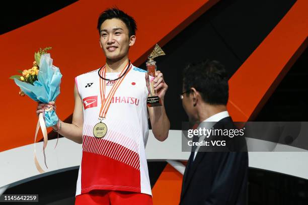 Kento Momota of Japan celebrates after the Men's Singles final match against Shi Yuqi of China on day six of the Asian Badminton Championship 2019 at...