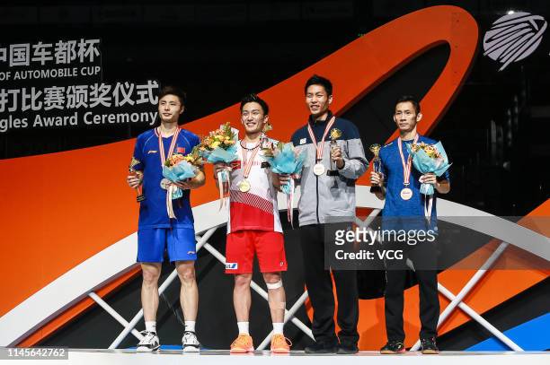 Shi Yuqi of China, Kento Momota of Japan, Chou Tien-chen of Chinese Taipei and Nguyen Tien Minh of Vietnam pose after the Men's Singles final match...