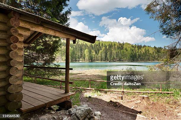 log cabin at lake frillensee - log cabin stock pictures, royalty-free photos & images