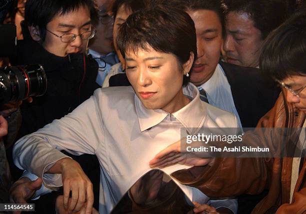 Social Democratic Party lawmaker Kiyomi Tsujimoto is seen upon departure after appearing on a television program at TBS headquarters on March 25,...