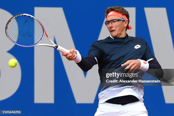 Denis Istomin of Uzbekistan plays a fore hand during his quaterfinal qualification match against Prajnesh Gunneswaran of India on day 2 of the BMW...