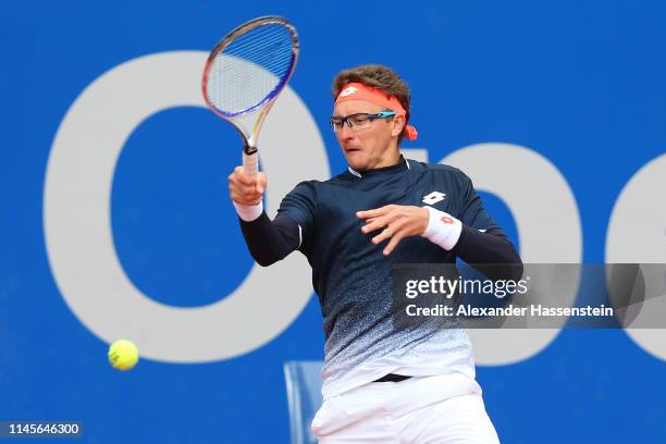 Denis Istomin of Uzbekistan plays a fore hand during his quaterfinal qualification match against Prajnesh Gunneswaran of India on day 2 of the BMW...