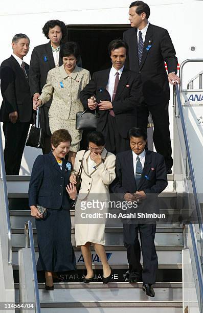 Fukie Hamamoto and Yasushi Chimura , Yukiko Okudo , Kaoru Hasuike and Hitomi Soga are seen upon arrival, accompanied by head of Japanese government...