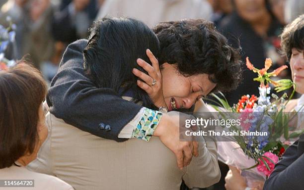 Hitomi Soga hugs to her friend at Mano City Hall on October 17, 2002 in Mano, Niigata, Japan. Five of 13 Japanese nationals that North Korea has...