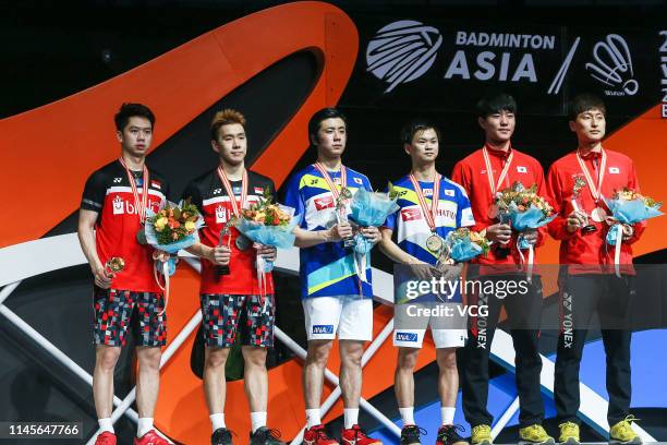 Marcus Fernaldi Gideon and Kevin Sanjaya Sukamuljo of Indonesia, Hiroyuki Endo and Yuta Watanabe of Japan and Kang Min-hyuk and Kim Won-ho of South...