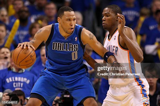 Shawn Marion of the Dallas Mavericks posts up Kevin Durant of the Oklahoma City Thunder in the third quarter in Game Four of the Western Conference...