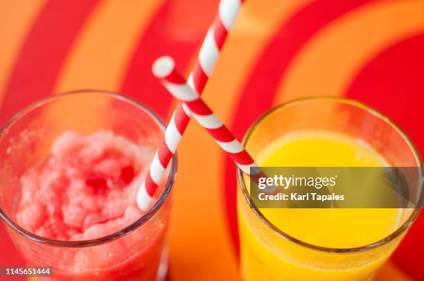 mango and watermelon shake with paper straw - mango smoothie stock pictures, royalty-free photos & images