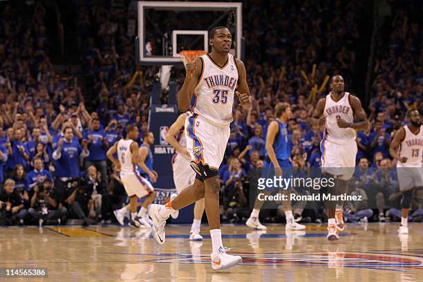Kevin Durant of the Oklahoma City Thunder reacts in the fourth quarter while taking on the Dallas Mavericks in Game Four of the Western Conference...