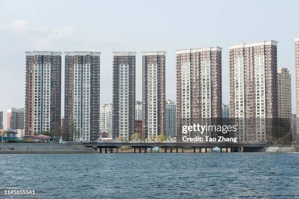 General view of high-rise apartment buildings in Dandong, a Chinese city on the border with North Korea on April 28, 2019 in Dandong, China.The...