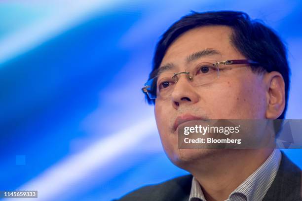Yang Yuanqing, chairman and chief executive officer of Lenovo Group Ltd., pauses during a news conference in Hong Kong, China, on Thursday, May 23,...