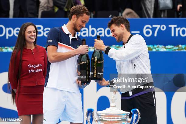 Daniil Medvedev of Russia, finalist, and Dominic Thiem of Austria, winner, celebrate their results after the final match during day seven of the...
