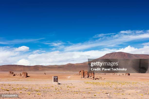 monjes de pacana rock formation in los flamencos national reserve at the atacama desert, chile, january 18, 2018 - antofagasta fotografías e imágenes de stock