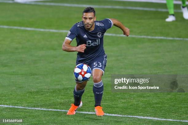 Vancouver Whitecaps defender Ali Adnan controls the ball during the second half of the Major League Soccer Game between the Vancouver Whitecaps and...